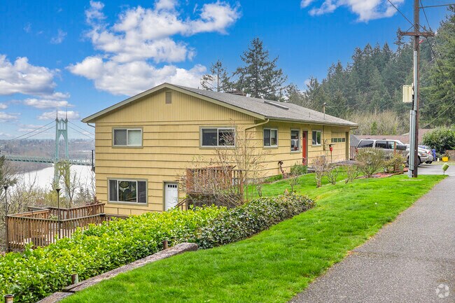 Vibrant mid-century ranch home with views of St.John's Bridge and the Willamette River in Linnton.