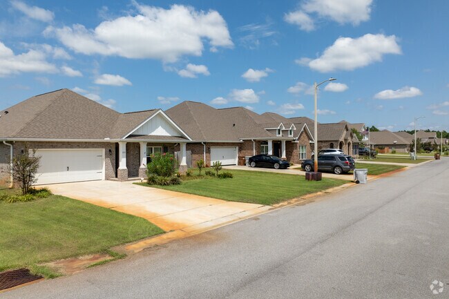 New traditional homes line quiet streets in Holley, FL.