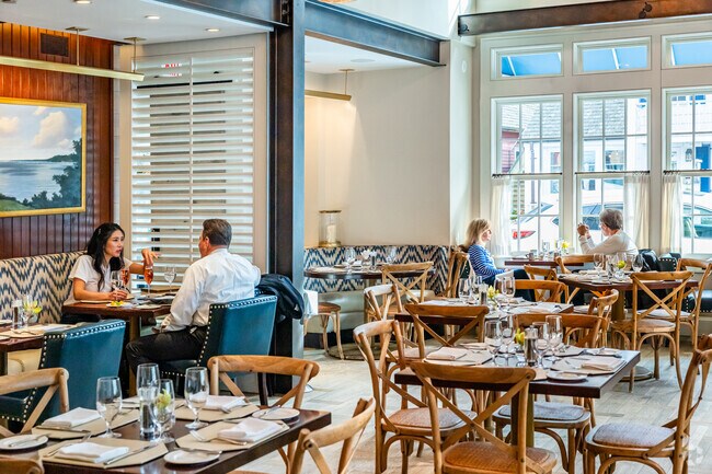 Enjoy lunch or dinner at Sandbar, a popular waterfront spot in Cold Spring Harbor.