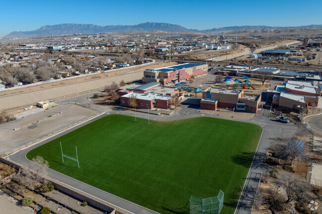 Grass field and mountain views at Mountain View Elementary School.