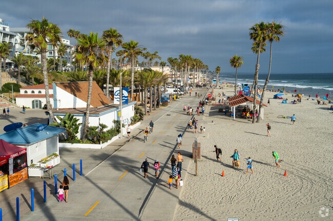 Visitors love to stroll along the strand area in Oceanside near Loma Alta.