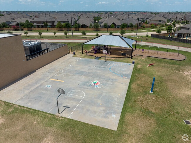 The basketball court is an alternative at recess at Jenks Elementary in Southwest Cinco Ranch.