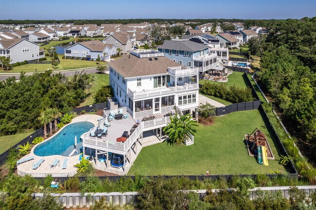 Oyster Point in Mount Pleasant has large waterfront homes with spacious lawns.