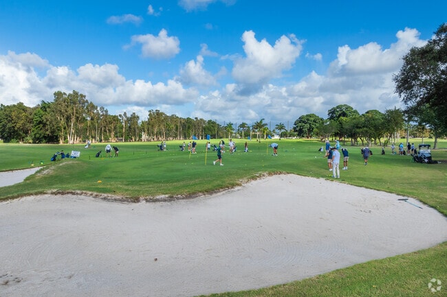 Golfers enjoy 18 holes at Village Golf Club, minutes from Baywinds in West Palm Beach.