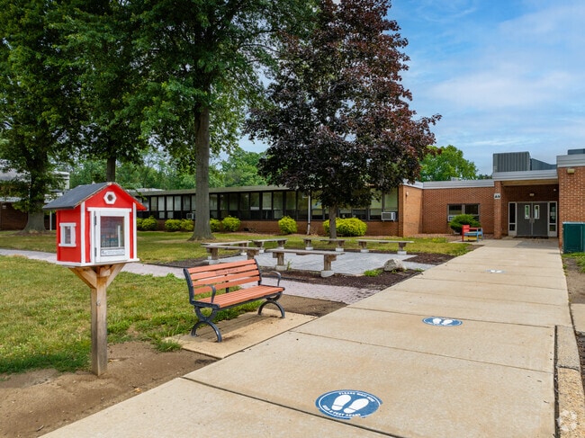 Lafayette Mills Elementary School has a free library as well as a seating area for students.