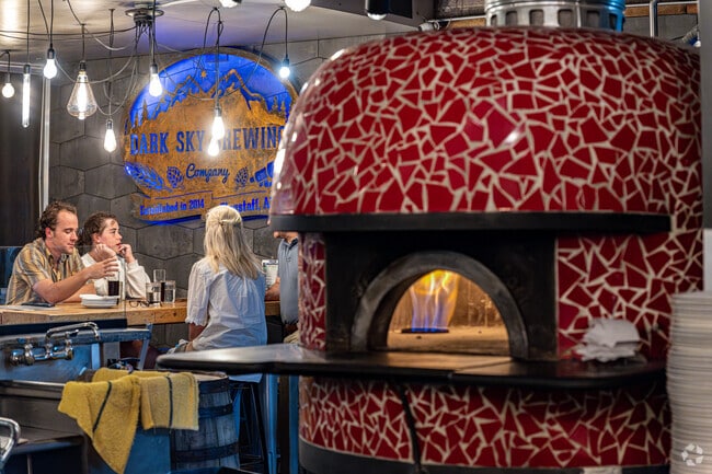 Residents of University Heights love to head over to Dark Sky Brewery for pizza and craft beer.