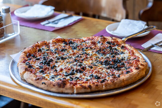 Red Rose Has A Full Menu Of Italian Favorites But The Award Winning Pizza Is Their Specialty
