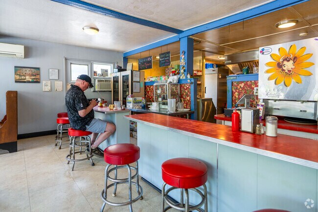 A man sits at the counter in Carm’s Restaurant and Coffee Shop in Chester.