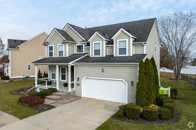 Large colonial style homes provide plenty of room for projects in the garage.