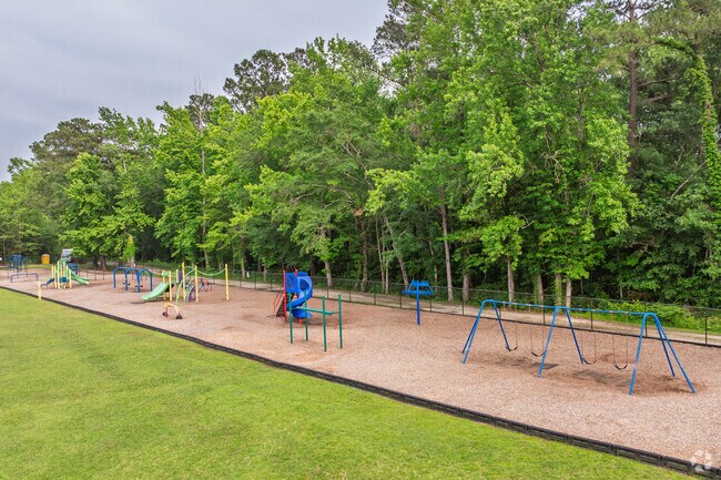 Students enjoy a spacious playground at Bolivia Elementary School with modern equipment.
