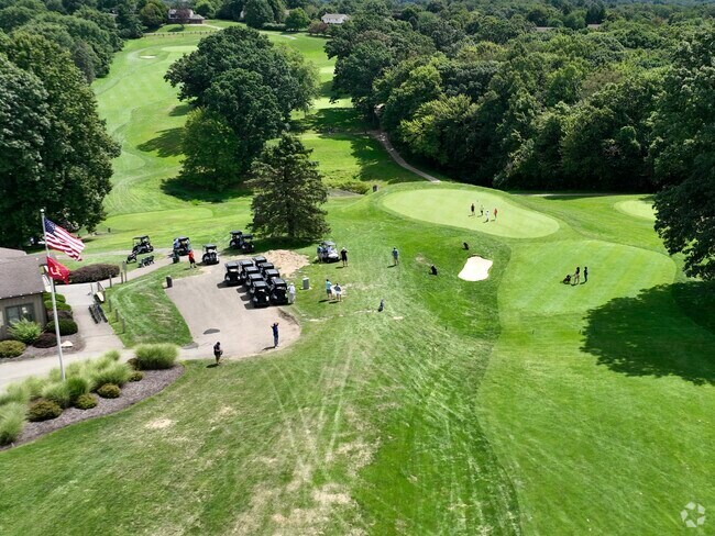 Franklin Park residents enjoying a beautiful round of golf at Clover Hill Golf Course.