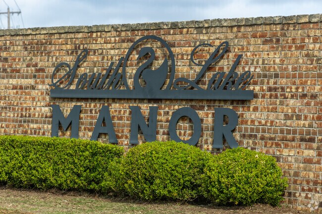 The South Lake Manor neighborhood has a beautiful brick entry sign into the residence area.
