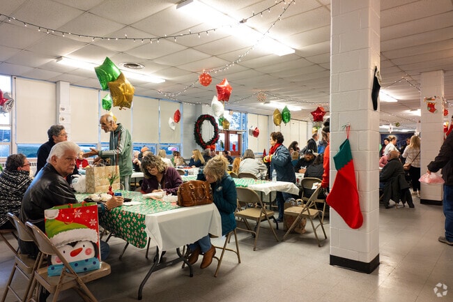 Norristown residents gather to celebrate the holiday season at St Paul's Christmas Market.