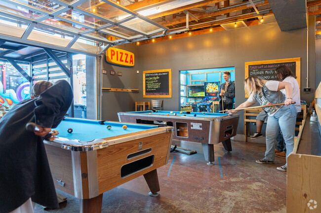 Play pool, arcade games or watch sports while sipping a cold brew at Chill n' Fill.
