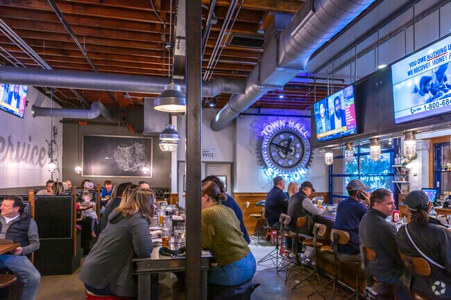 Grab a delicious bite of food and a favorite beverage at Town Hall Station in Concord.