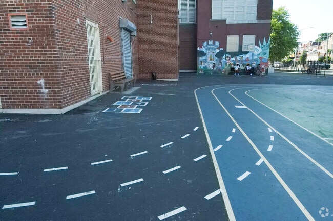 The Walter Kassenbrock School courtyard has a walkable track in Fort Hamilton.