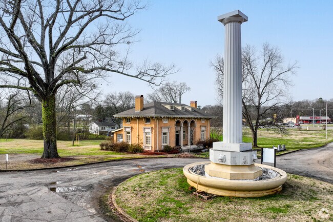The Valhalla cemetery is a historic funeral home with a fountain.