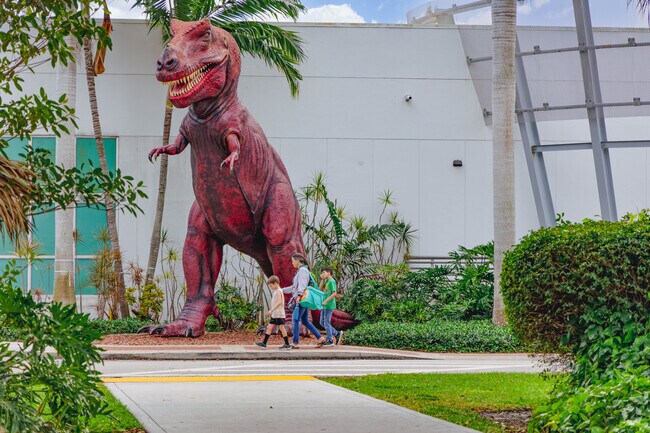A Dreher park family leaving the Cox Science Center and Aquarium.