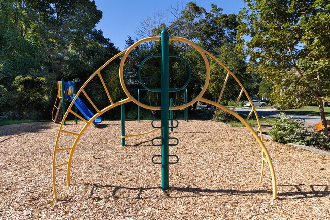 The 12th Avenue Playground provides a place for children to play near Walnut Square.