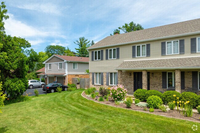 Homes in Baldwin often have large lawns and driveways.