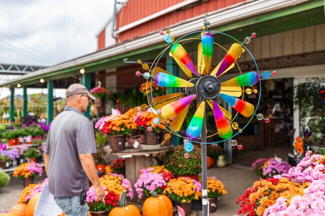A man walks into Country Bumpkin Garden Center, a family owned business in Ivanhoe, IL.
