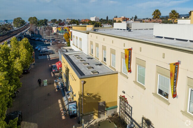 Arise High School is located has restaurants and shops right next to it.