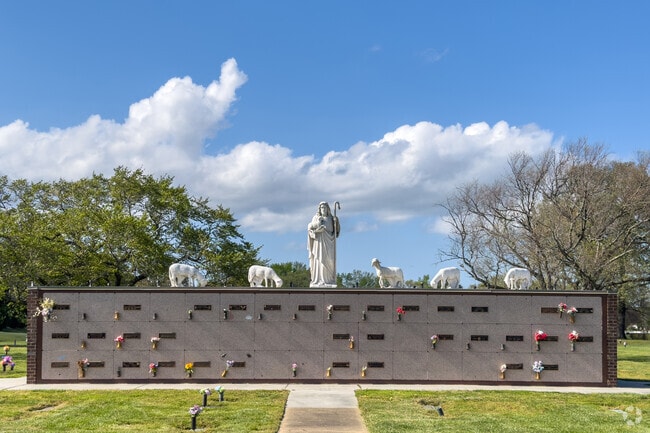 Large religious statue on cemetary grounds in Fairfield neighborhood of Kempsville section of Virginia Beach