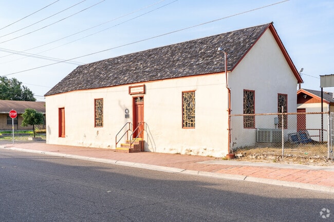 Spanish stucco style homes are popular in the downtown Roma area.