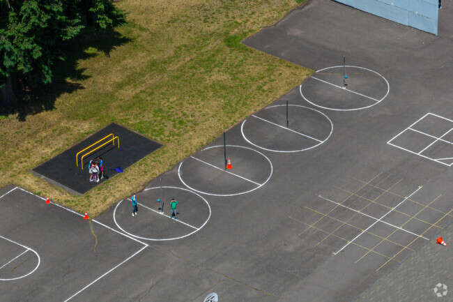 There is a lot of fun in the Grass Lake Elementary School's playground.