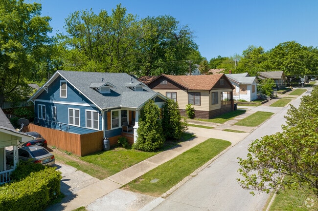 Bungalow homes are paired with well-maintained driveways and sidewalks in the Owen Park neighborhood.