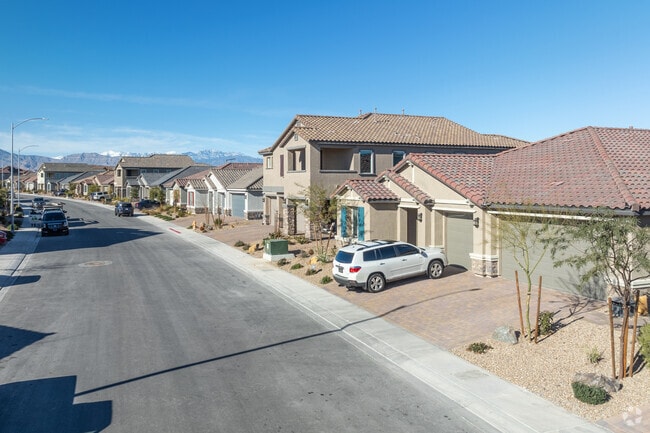 Residents of Aliante care for their front lawns and neighborhood streets.