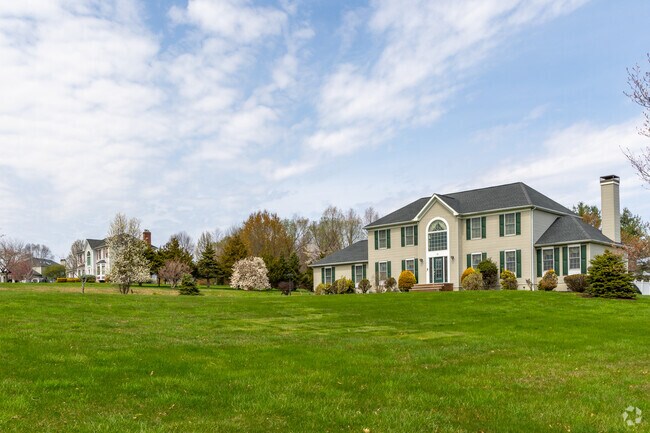 Most homes in Alexandria have large lawns with multi car garages.
