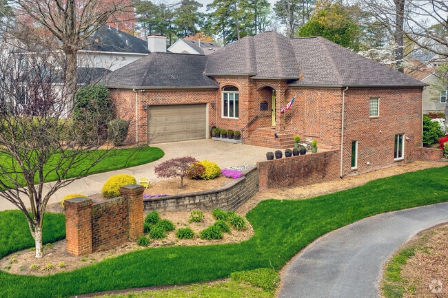 Bayside features brick homes with updated designs and classic curb appeal.