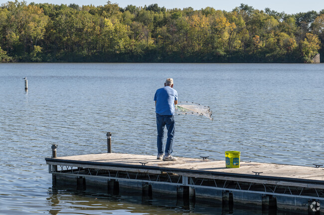 Fishing takes many forms on Lake Decatur and near the Grant Park neighborhood nets are cast.