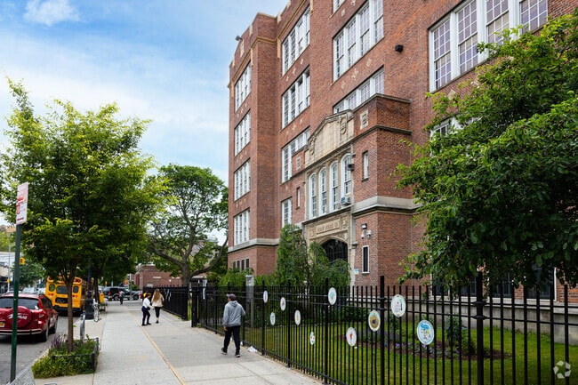 Located on a main strip, P.S. 69Q The Jackson Heights School exists within a diverse backdrop.
