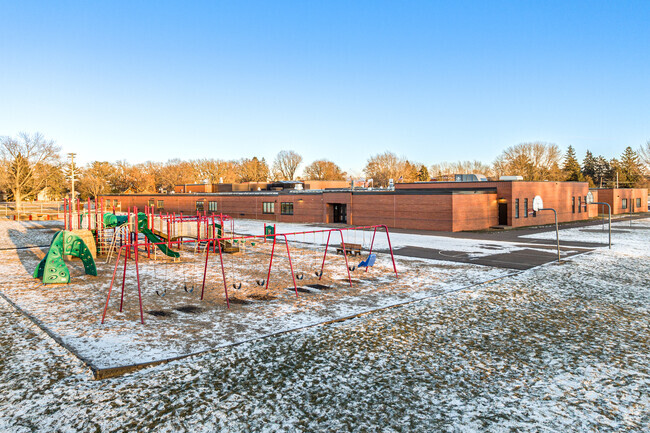 Children enjoy the playground during recess at Forest View Elementary