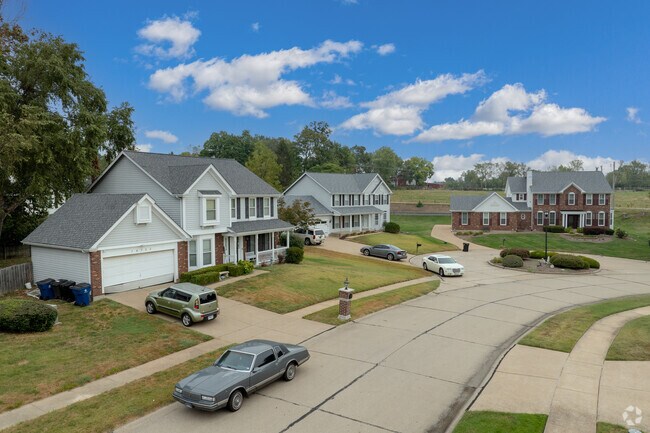 Modern homes line quiet streets in planned neighborhoods.