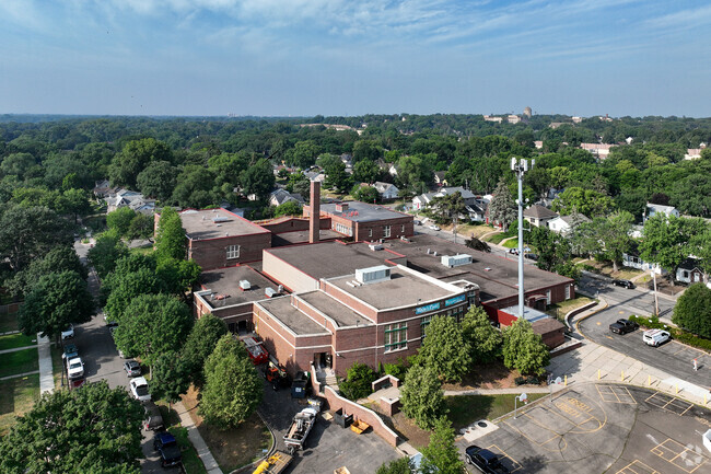 The school is located six blocks from Interstate 35W.