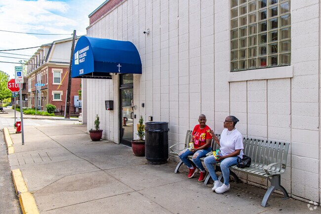 Middle Hill residents take pride in their community and lend an ear to a friend.