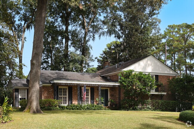 Several split-level homes in Highland Park share acadian design features.