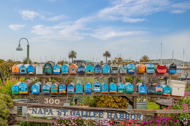 Residents of Napa St Galilee Harbor paint their mailboxes.