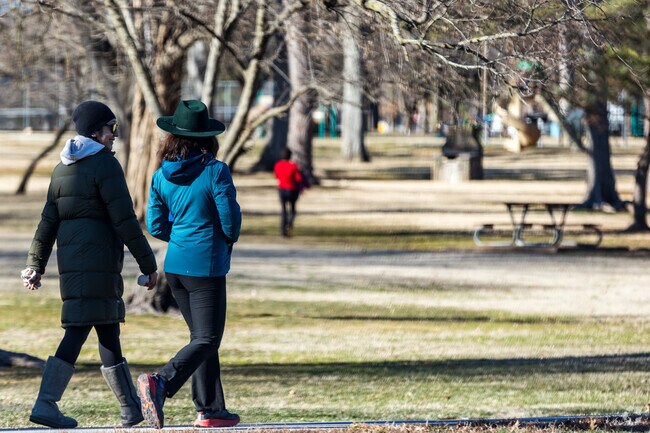 Phelps residents enjoy a sunny day at Phelps Grove Park.