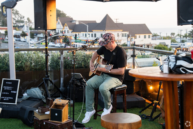 On Friday nights locals can enjoy the sunset and a fun jam band on the patio in Del Mar Plaza.