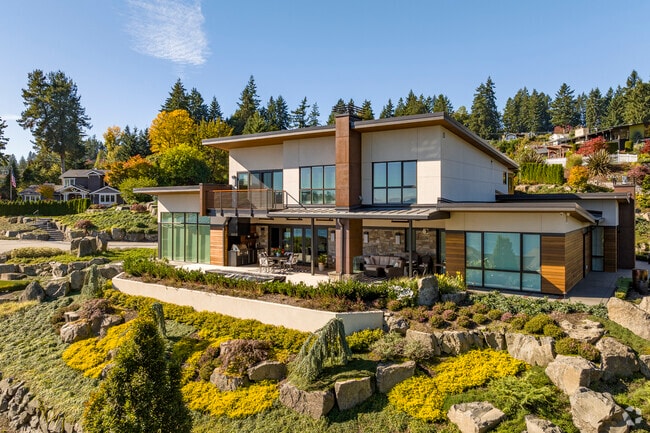Gorgeous landscaping at this beautiful modern home in Maplewood.