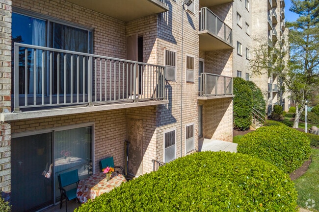 The Columbia Towers Condominium in Calverton offers private balconies and outdoor spaces.