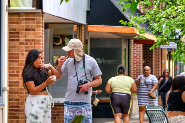 A couple shares some ice cream as they shop at the Kalamazoo Mall, near Stuart.
