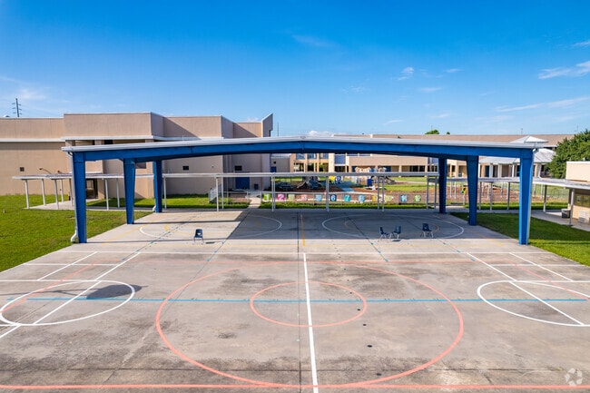 Children can utilize the covered play area at Dunedin Elementary School.
