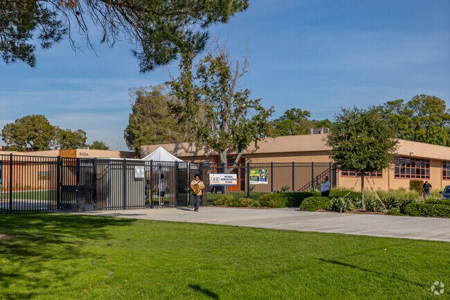 Teachers encourage learning at Orange High School.