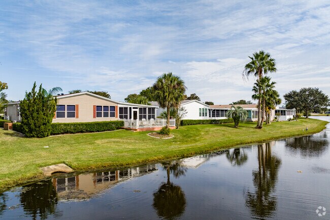 Some residents of Crane Lakes enjoy waterfront living on their decks.