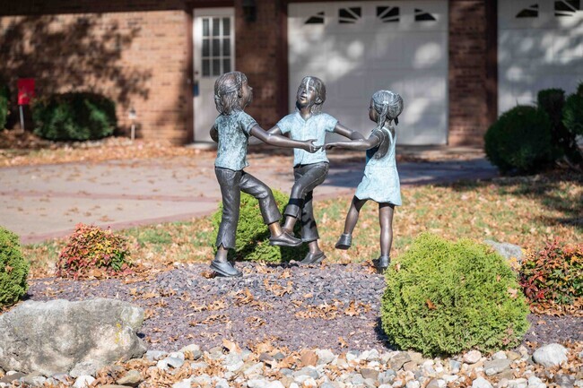 A fun children’s statue is displayed at a house in the Holiday Shores area.